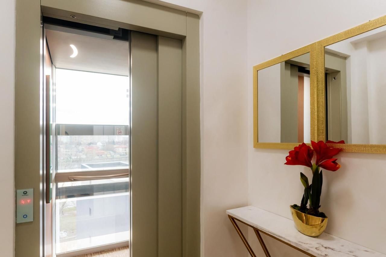 Отель Brater Luxury Бухарест