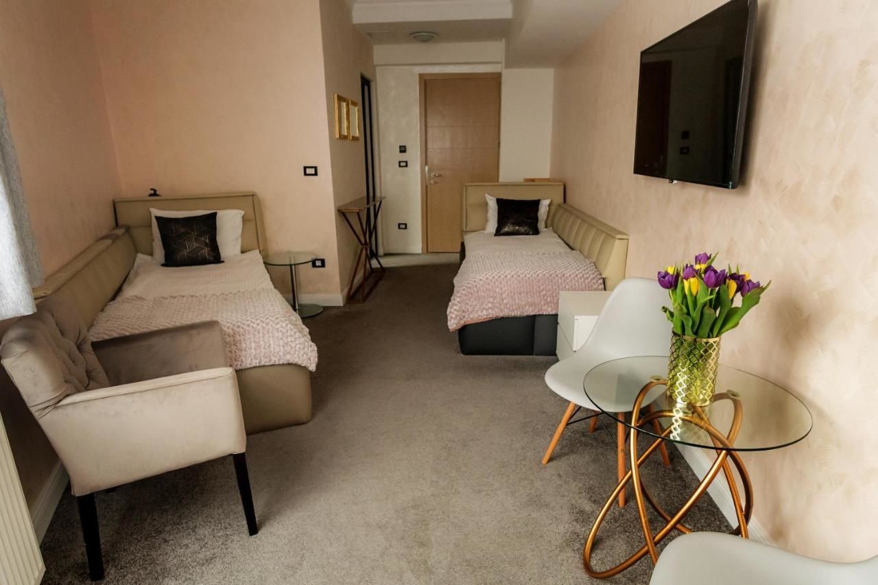 Отель Brater Luxury Бухарест