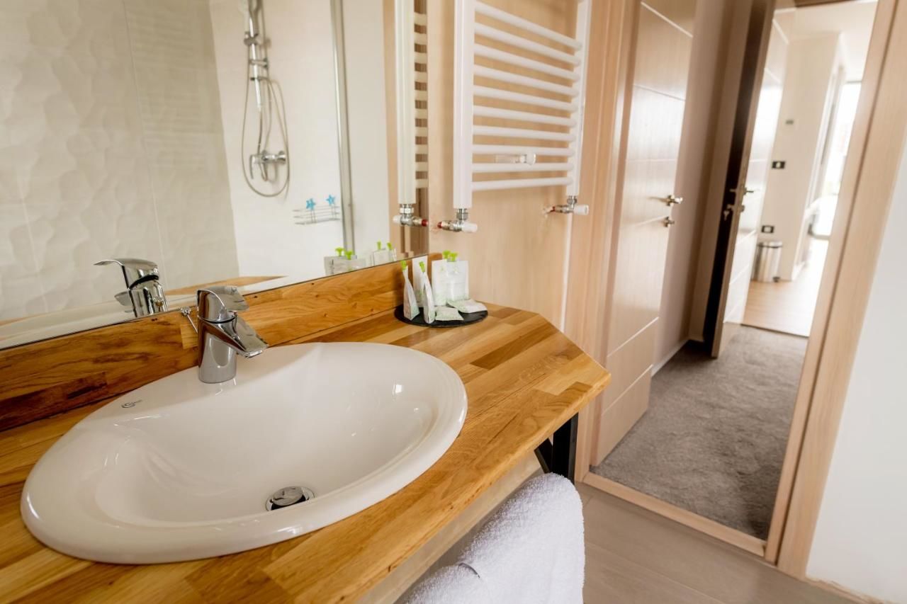 Отель Brater Luxury Бухарест